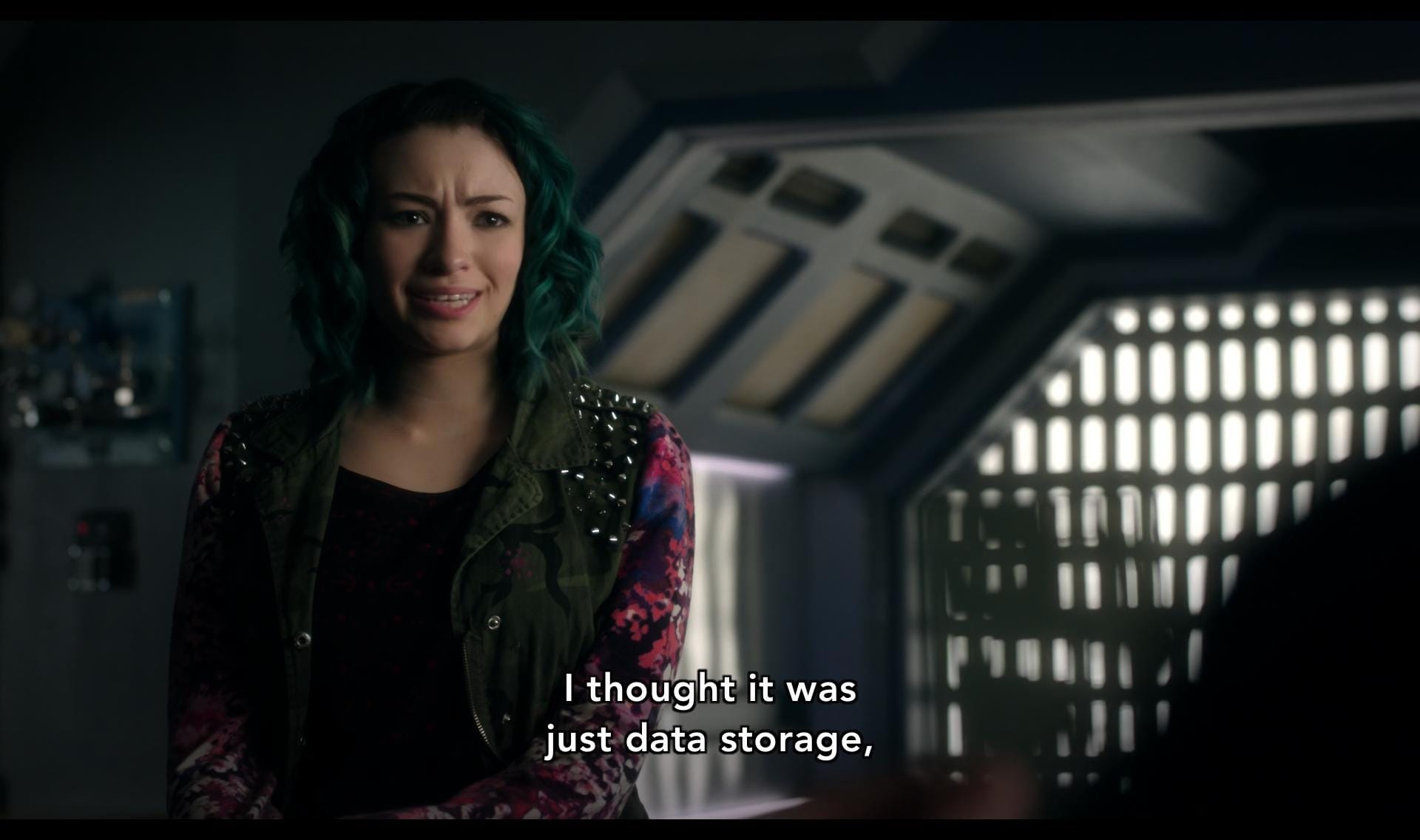 screenshot of dark matter (s01e07) featuring the character with blue hair (i forgot her number), saying, "i thought it was just data storage"