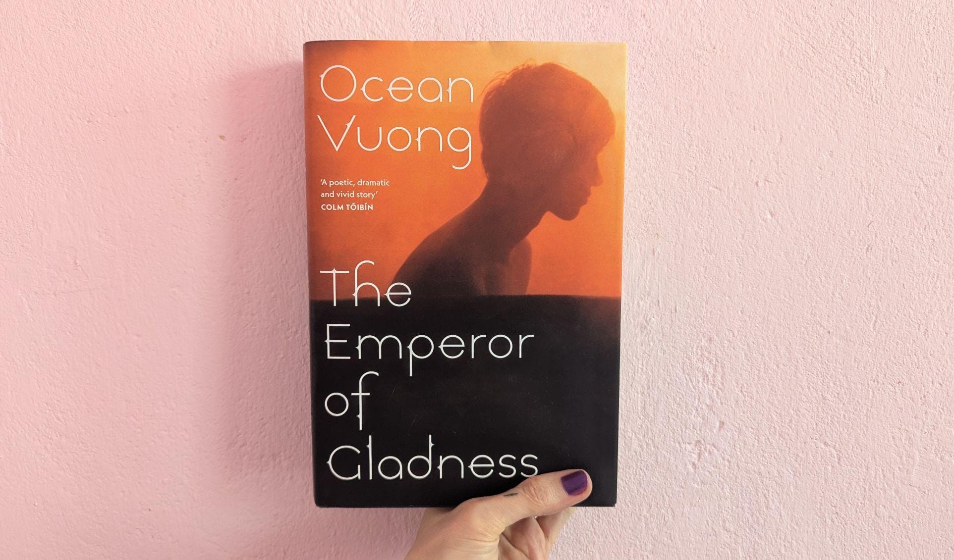 i'm holding my copy of ocean vuong's "the emperor of gladness"